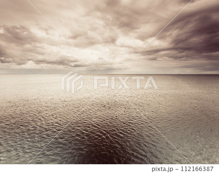 Idyllic shot of horizontal sea water and sky Idyllic shot of horizontal sea water and sky 112166387