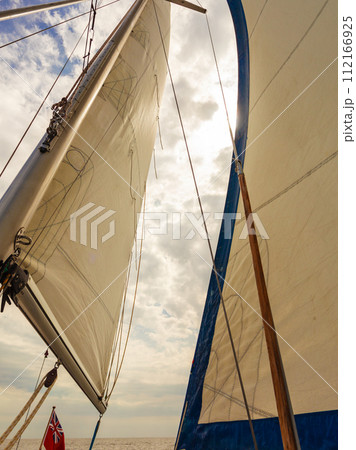 Detailed closeup of sail on sailboat 112166925