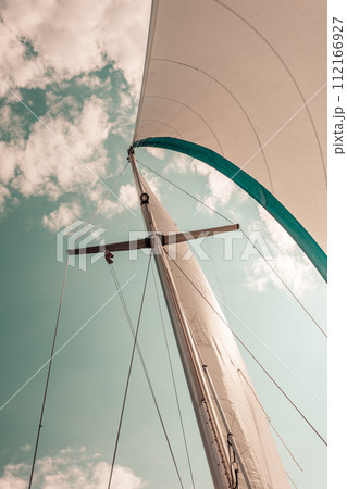 Detailed closeup of sail on sailboat 112166927