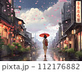 雨の中を歩く少女 112176882