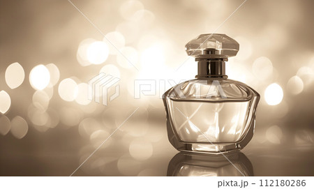 an elegant perfume bottle, glimmering with sophistication an elegant perfume bottle, glimmering with sophistication 112180286