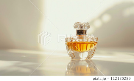 an elegant perfume bottle, glimmering with sophistication 112180289