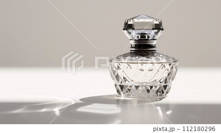 an elegant perfume bottle, glimmering with sophistication 112180296