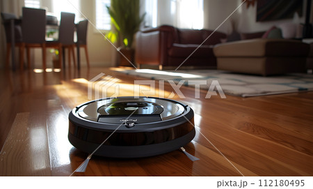 close up of a robotic vacuum glides seamlessly across a polished hardwood floor close up of a robotic vacuum glides seamlessly across a polished hardwood floor 112180495