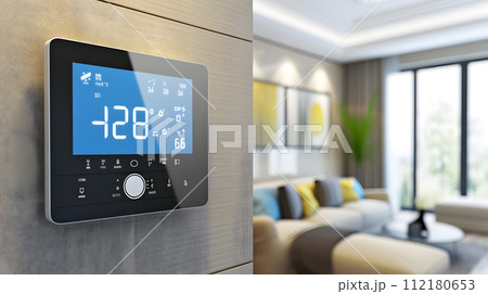 shot of a smart thermostat mounted on a living room wall, displaying an eco-friendly temperature setting shot of a smart thermostat mounted on a living room wall, displaying an eco-friendly temperature setting 112180653
