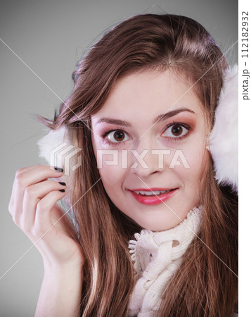 Young woman in wintertime. Young woman in wintertime. 112182932