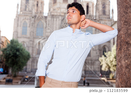 Man posing in gothic quarter of Barcelona Man posing in gothic quarter of Barcelona 112183599