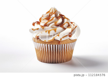 A delectable caramel drizzled cupcake with creamy frosting. 112184376