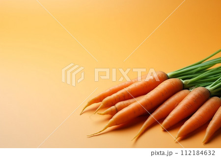 A photo of a bio carrots upper view, vegan diet, vegetarian healthy food 112184632