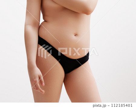 Natural Real woman body. Moms postpartum body with Natural Real woman body. Moms postpartum body with 112185401