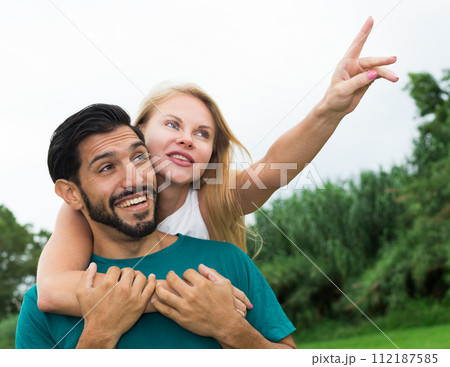 Portrait of couple who are viewing nature Portrait of couple who are viewing nature 112187585