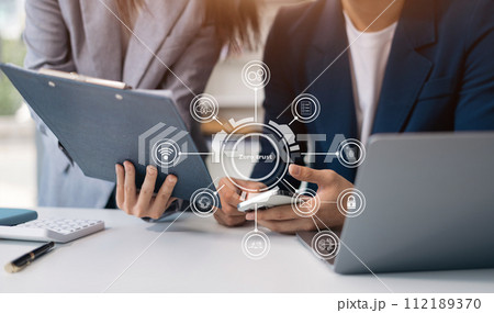 Zero trust security concept Person using computer and tablet with zero trust icon on virtual screen of Data businesses.in office. 112189370