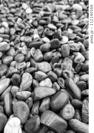 Wet eroded stones 112190566