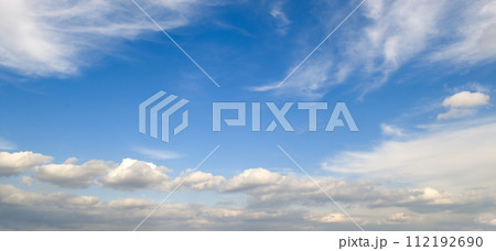 Blue sky and cumulus clouds. Wide photo. Blue sky and cumulus clouds. Wide photo. 112192690
