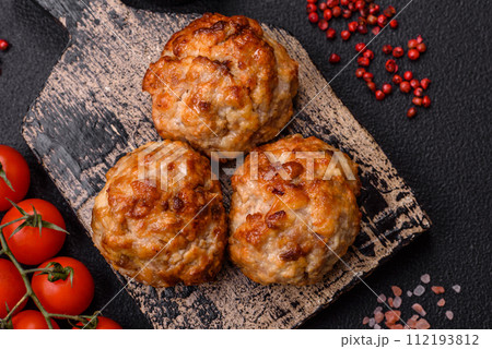 Delicious fresh fried minced fish cutlets with spices and herbs 112193812