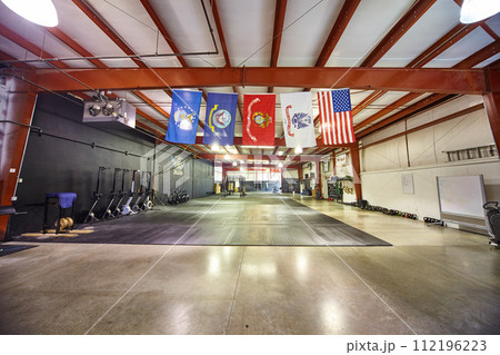 Spacious Gym with Crossfit Zone and Patriotic Flags, Wide Angle View 112196223