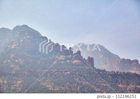 Sedona Red Rock Mountains with Hazy Sky Perspective Sedona Red Rock Mountains with Hazy Sky Perspective 112196251