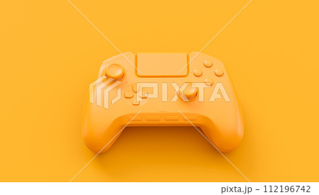 Video game joystick or gamepad in plain monochrome yellow color background 112196742
