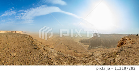 The Jabal Tuwaiq Mountains, with arid desert below, landscape panorama, Riyadh, Saudi Arabia 112197292
