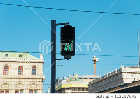 Gay couple pictured at a traffic light in Vienna. 112197645
