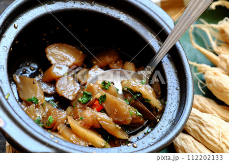 vegan food for daily meal, salted white radish cook with sauce and sesame vegan food for daily meal, salted white radish cook with sauce and sesame 112202133