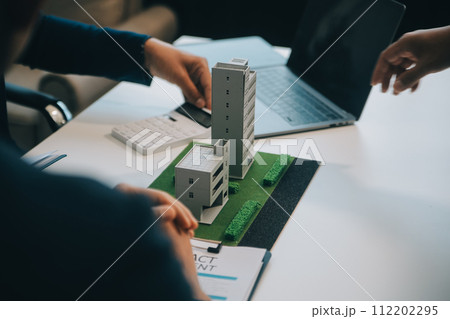 Real estate agent talked about the terms of the home purchase agreement and asked the customer to sign the documents to make the contract legally, Home sales and home insurance concept. 112202295