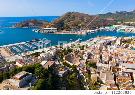Aerial view of Cartagena port city with buildings and coast line, Murcia Aerial view of Cartagena port city with buildings and coast line, Murcia 112202926