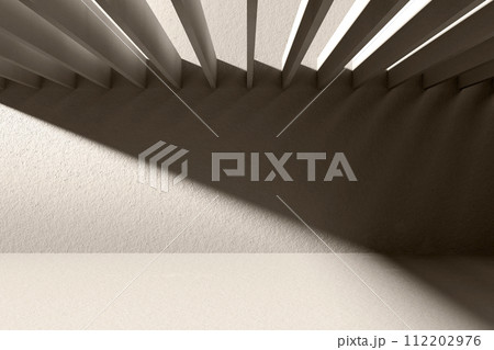 A black and white background with light coming through the building structure. 112202976