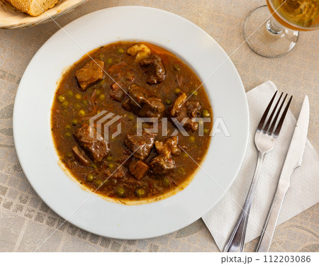 Stewed beef with vegetables (Ternera la Jardinera) - this is Spanish traditional meat dish Stewed beef with vegetables (Ternera la Jardinera) - this is Spanish traditional meat dish 112203086
