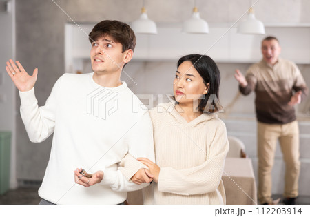 Young married couple leaves home, leaving father alone at home 112203914