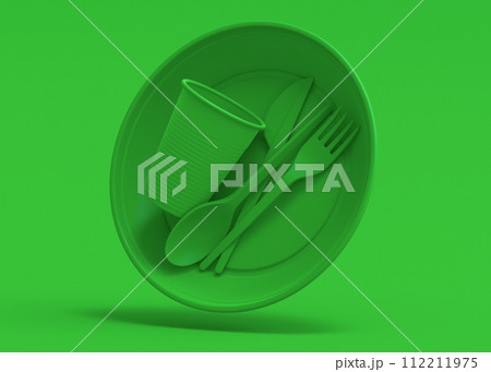 Set of disposable utensils like plate, folk, spoon,knife, cup and pepper mill 112211975