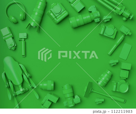 Top view of designer workspace and photography gear on monochrome table 112211983