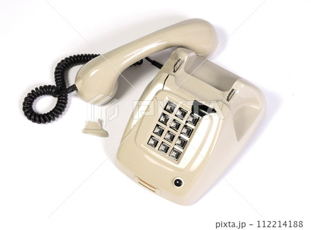 Part of a broken old telephone, phone with dial plate - plastic phone 112214188