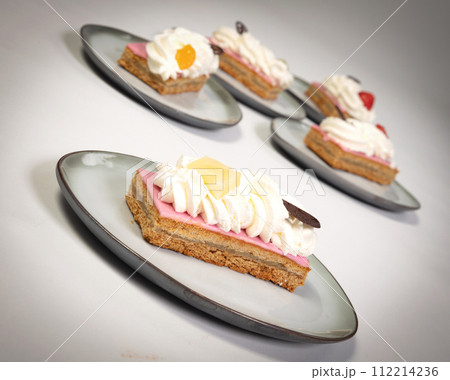Pieces of traditional dutch oranjekoek, local delicacy from Friesland 112214236