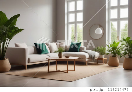 Interior of living room with green houseplants. Sofas, wooden coffee table, furniture. Scandinavian nordic minimalist style. Neutral Gray walls, big panoramic windows. Cozy apartment. Boho home decor 112214475