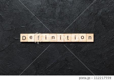 Definition word written on wood block. Definition text on cement table for your desing, concept Definition word written on wood block. Definition text on cement table for your desing, concept 112217559