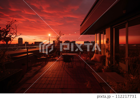 Sunset on the terrace of a restaurant in the city. 112217731