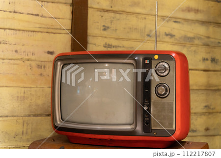 Close-up view of a vintage TV with antenna. 112217807
