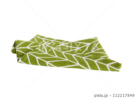 Green textile napkin isolated on white background. Folded decorative kitchen cotton towel. Top view Green textile napkin isolated on white background. Folded decorative kitchen cotton towel. Top view 112217849