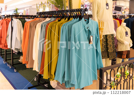Close-up view of Baju Melayu on hangers for sale. 112218007