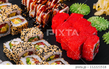 Sushi set on black stone background 112221518