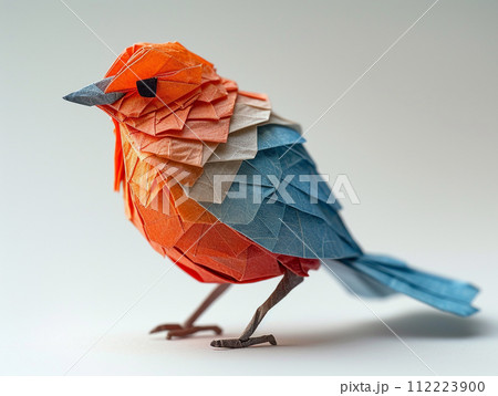 Beautiful bird origami on white background in minimalist style.  112223900