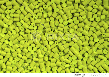 The pile of green pellets materials for plastic injection process. The pile of green pellets materials for plastic injection process. 112226807