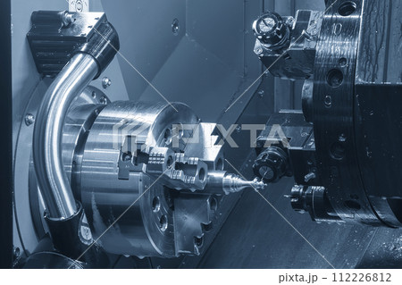 The CNC lathe machine milling the metal shaft parts by milling spindle. The CNC lathe machine milling the metal shaft parts by milling spindle. 112226812