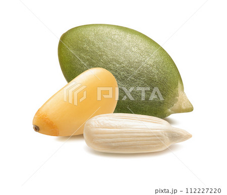 Pine tree nut, green pumpkin and sunflower seeds isolated on white background Pine tree nut, green pumpkin and sunflower seeds isolated on white background 112227220