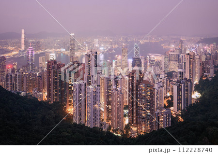 Hong Kong urban skyline at moody dusk. Hong Kong urban skyline at moody dusk. 112228740