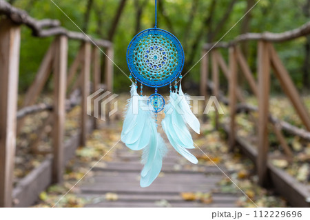 Handmade dream catcher with feathers threads and beads rope hanging 112229696