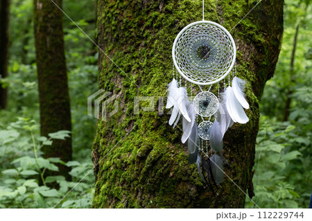 Handmade dream catcher with feathers threads and beads rope hanging 112229744