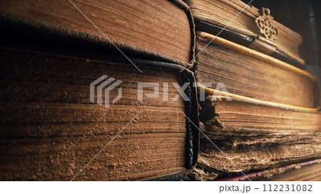 Old books in antique shop or abandoned library. Macro footage. Bookstore Old books in antique shop or abandoned library. Macro footage. Bookstore 112231082