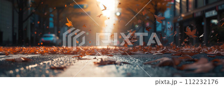 Autumn maple leaves falling on the city street. 112232176